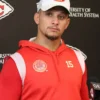 Patrick Mahomes Kansas City Chiefs hoodie – red pullover with team logo, front pocket, and Mahomes’ name and number.