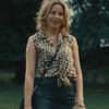 Elizabeth Banks wearing a leopard print sleeveless top from The Better Sister – stylish women's blouse featuring bold animal print and a flattering sleeveless design.