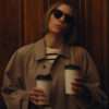 Jessica Biel wearing a brown coat from The Better Sister – long women's overcoat with a tailored fit, lapel collar, and classic minimalist design.