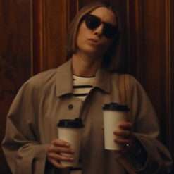 Jessica Biel wearing a brown coat from The Better Sister – long women's overcoat with a tailored fit, lapel collar, and classic minimalist design.