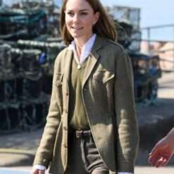 Princess Kate wears a stylish brown blazer during her visit to the Isles of Mull and Iona, featuring a classic tailored fit that exudes sophistication and timeless elegance.