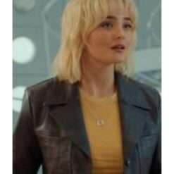 Millie Gibson wearing a dark purple leather blazer from Doctor Who Season 15 – sleek women's jacket with a tailored fit, classic lapels, and rich leather texture.