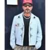 AJ McLean wearing a blue jacket with skull print from Tudum 2025 – edgy men's outerwear featuring bold skull graphics, zip-up front, and a modern fit.